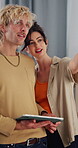 Couple, pointing and people with tablet, new house and happy for interior design on website and app. Online, man and woman with technology for home renovation, relax and research for remodeling ideas