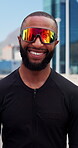 City, athlete and man with sunglasses, happy and confident for sport competition or workout routine. Outdoor, runner and black person with eyewear on road, break and smile for fitness and exercise