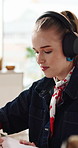 Headphones, woman and student drawing in house with creative test, exam or project for university. Artistic, audio tech and female person listening to music with sketching for college assignment.