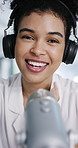 Face, podcast and woman with microphone, interview and entrepreneur with questions and conversation. Entertainment, POV and headphones with female person for live streaming, chat and on air in studio