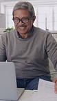 Old man, glasses and happy with laptop, house and planning for retirement with paperwork and online. Reading, report and senior person with tech for asset management, relax and smile for pension fund