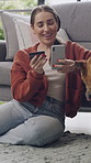 Woman, phone and credit card with dog in home on floor, relax and online shopping in living room. Person, smartphone and pet animal with e commerce, fintech or payment on mobile app at apartment
