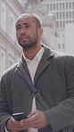 Business, smartphone and man in city, walking and digital app for social media, email and internet. Outdoor, employee or cellphone for communication, person or message to contact, travel or network