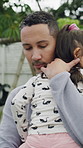Hug, father and girl in backyard, comfort for peace and bonding together for love. Family, parent and dad in garden, wellness and empathy for emotion, support and security for safety and compassion