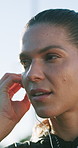 Fitness, music and woman outdoor with earphones for audio, workout and exercise for training in city. Happy, runner and person with song, radio and playlist for mindfulness, sports and practice
