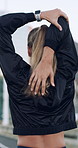 Back, woman and stretching for fitness in city to start exercise, marathon practice and cardio. Athlete, female person and getting ready with muscle warm up, endurance training and workout challenge