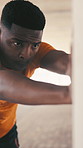 Breathing, exercise and stretching with black man outdoor for preparation or start of cardio workout. Fitness, training and warm up with African runner in city for balance, challenge or health