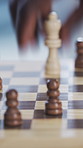 Chess, hand and game with strategy, timelapse and problem solving in competition in house. People, contest and play with chessboard for challenge, hobby and versus with match together at home