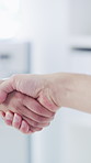 Welcome, shaking hands and meeting with business people in office for contract, b2b and teamwork. Partnership, introduction and handshake with employees in agency for agreement, deal and thank you