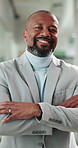 Face, business and black man with arms crossed in office for career pride, about us and real estate. Portrait, mature person and realtor with ambition, happy employee and agency for property auction