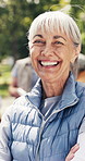 Face, volunteer and woman with arms crossed, park and happy with social responsibility and kindness. Outdoor, nonprofit and mature person with smile for community service, help and charity in nature