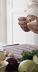Cooking, kitchen and hands of chef with garlic for gourmet recipe, meal prep and culinary service. Hospitality, food and person with ingredients for dinner, lunch and supper for catering business