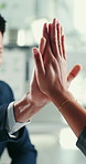 Business people, hands or success with high five in office for teamwork, winning or achievement. Closeup, employee or colleagues with touch in celebration for coworking cohesion or moral in workplace