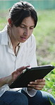 Scientist, typing and woman with tablet, plants and inspection for pest management and study on web. Outdoor, agronomist and person with tech for data collection, science or check crop growth rate