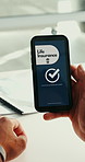 Man, hands and life insurance in office with phone screen, website and online registration approval. Person, typing and tech with mobile app, sign up and application success for policy cover account.