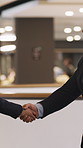 Business, handshake and greeting with people, welcome or introduction in office for seminar. Collaboration, professional and shaking hands for hello, partnership or b2b deal at conference for meeting