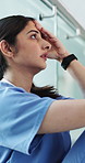 Upset, woman and nurse with stress in clinic for medical mistake, failure or crisis with burnout. Tired, frustrated and female healthcare worker with fatigue for error at bad appointment in hospital.