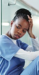 Tired, black woman and nurse with stress in hospital for medical mistake, failure or crisis with burnout. Upset, frustrated and African healthcare worker with fatigue for error at bad appointment.