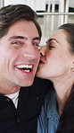 Happy couple, selfie and face with kiss in home with bonding, connection and laugh with post on web. Man, woman and smile with partner, photography and portrait for social media at house in Spain