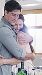 Cooking, hug and happy couple in kitchen with food for meal prep, healthy lunch and dinner recipe together. Home, love and people with ingredients and vegetables for nutrition, vitamins and wellness