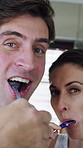 Brushing teeth, mirror and face of couple in bathroom for dental hygiene, cleaning and bonding. Marriage, happy and pov of man and woman with toothbrush for morning routine, oral care and wellness