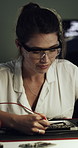 Night, computer and woman with hardware for IT maintenance, repair and diagnostics for software. Dark, technician and person on tech with troubleshooting for system test, coding and programming