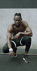 Weightlifting, fitness and face of black man in gym for workout, active or muscle training with strength. Portrait, equipment and African person with barbell for exercise or health in sports center.