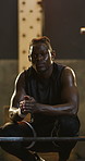 Face, black man and bodybuilder in gym for fitness, workout or training break with barbell. Muscle, weights and confident person in exercise club for rest with sweat, health or portrait with wellness