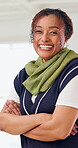 Marketing, face or African woman in office with arms crossed, pride or job in advertising agency. Smile, portrait or mature branding analyst with confidence, career or experience as media planner.
