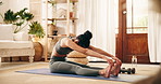 Yoga mat, stretching and woman in home for wellness, health and exercise preparation. Pilates, muscle flexibility and person on floor for self care, warm up legs and forward bend for fitness practice
