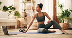 Yoga, tutorial or woman on floor with laptop, fitness or health guide in online subscription. Digital, preparation or female person in house with tech, stretching or warm up tips on wellness app.