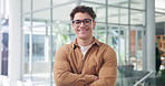 Face, creative and happy businessman in office, about us and magazine editor with career pride. Portrait, smile and professional worker with glasses, confidence and publisher with arms crossed