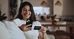 Happy woman, credit card and payment on couch with phone, online shopping and discount for purchase. Person, smile and typing banking info in home with tech, eft transaction and sale for ecommerce.
