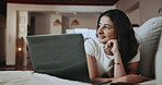 Woman, thinking and happy with laptop on couch, home or research for article, online and remote work. Freelancer, reflection and person with tech for ad campaign and email marketing with blog post