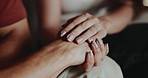 Stress, holding hands and couple on sofa with support, comfort and empathy for crisis or pain in home. Mental health, woman and man with grief on couch together with marriage and care or kindness
