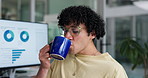 Coffee, computer screen and data with man in office for break or review of statistics charts.  Business, graphs and glasses with happy employee drinking beverage in workplace for information analysis