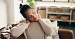 Stress, woman and massage neck pain on sofa for muscle cramp, stiffness and pinched nerve. Discomfort, female person or stretching to relieve joint ache, shoulder inflammation or poor posture in home