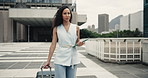 Business, walking and woman in city, suitcase for travel and commute with urban town. Outdoor, person and professional with luggage for career pursuit, work trip and journey with job opportunity