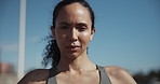 Fitness, runner and face of woman in city for wellness, health or workout in morning with pride. Serious, sports and portrait of female athlete with confidence for exercise, cardio or training.