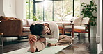 Stretching legs, yoga and woman in home for health, wellness and mobility exercise in morning. House, floor and person with practice, hobby and fitness routine for posture, flexibility and balance