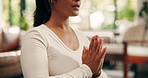 Prayer hands, yoga and meditation on floor in house for mindfulness, breathing exercise and wellness in lounge. Person, namaste and mudra for holistic health, balance and living room at apartment