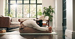 Stretching, yoga mat and woman in morning for health, wellness and mobility exercise in home. House, floor and person with practice, hobby and fitness routine for posture, flexibility and balance