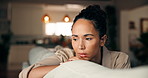 Stress, thinking and woman with depression in home, worry or loneliness with broken heart. Lost in thoughts, reflection and person with anxiety, sad and memory for breakup on sofa in living room
