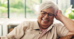 Face, funny and old woman on sofa, house and happiness with humor in living room. Apartment, pensioner and senior person on couch, smile and relax with joke, laughing and retirement with break