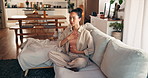 Breathing, calm and woman on sofa in home for meditation, mindfulness and balance in morning. Zen, relax and female person in living room with yoga practice for health or wellness in apartment.