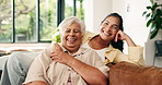 Senior mom, happy and face of woman on sofa for bonding, relationship and laughing in home. Family, women and portrait of elderly mother and daughter in living room for embrace, love and connection