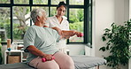 Physiotherapist, dumbbells or senior women in clinic, medical help or explain arm exercise for recovery. Healing support, assistance or old person with specialist for rehabilitation, weights or talk
