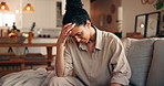 Home, headache and woman on sofa, pain and frustrated with health risk, brain fog and burnout. Apartment, financial crisis or person on couch, migraine or tired with stress or fatigue in living room