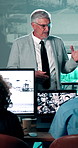 Man, presentation or talk in security agency with computer screen, safety training or mentorship. Manager, people and speaking in control room with CCTV surveillance tech, workshop or system insight.