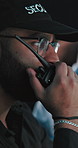 Radio, security guard or man in office, speaking or cctv monitor for protection, audio or report. Crime info, building safety or person in control room, surveillance agency or two way intercom system